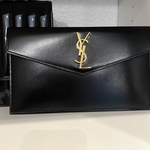 Brand New Never Worn with Tag attached to dust bag. Comes with box and dust bag